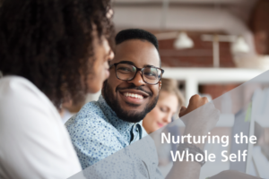 man smiling at woman sitting to his right - Nurturing the whole self - TED Talks