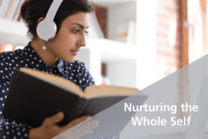 woman with headphones reading a book - TED Talks nurturing the whole self