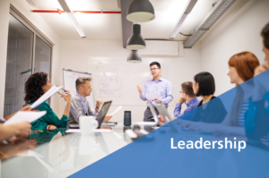 Team in meeting room - Leadership - Menttium Mentor Programs
