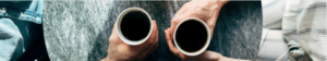 two people holding coffee mugs